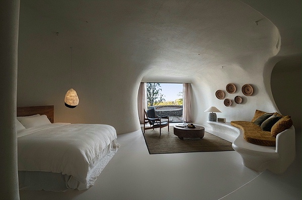 亿伽设计-汤泉设计-崖壁泳池度假酒店：原始洞穴体验的空间转译