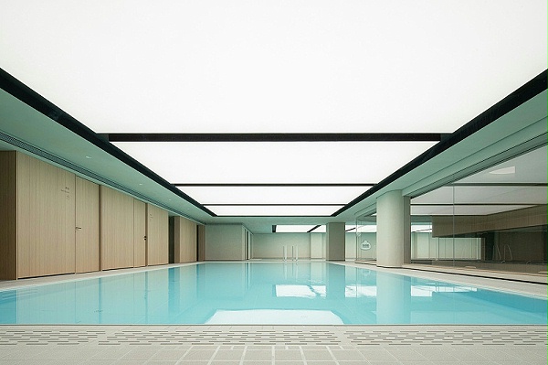 亿伽设计-温泉设计-汤泉设计-菠萝王国游泳馆：“诚实设计”与“极简主义”演绎岁月之美